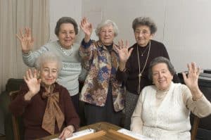 senior women at the game table